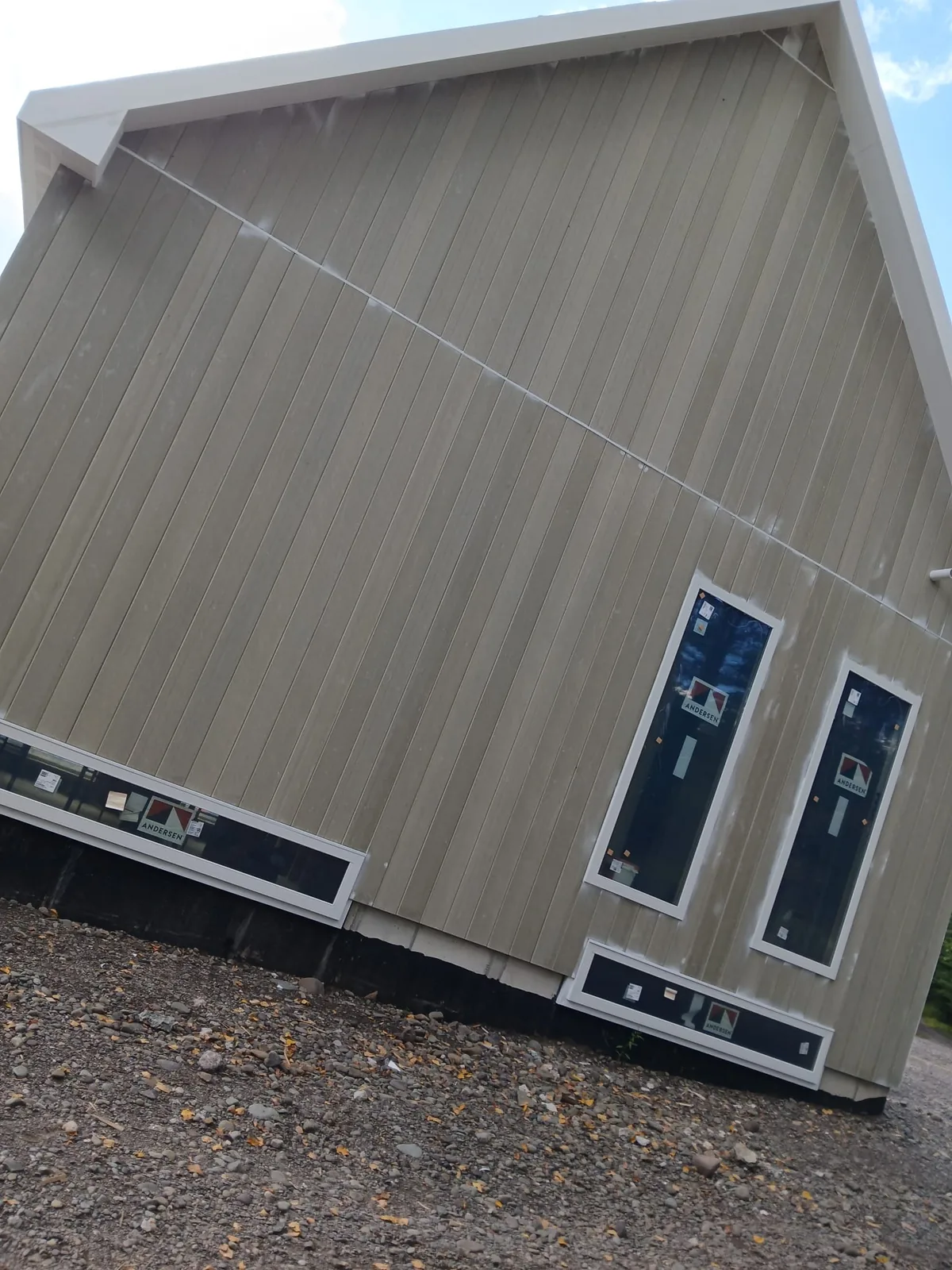 Board-and-batten siding installed around new windows